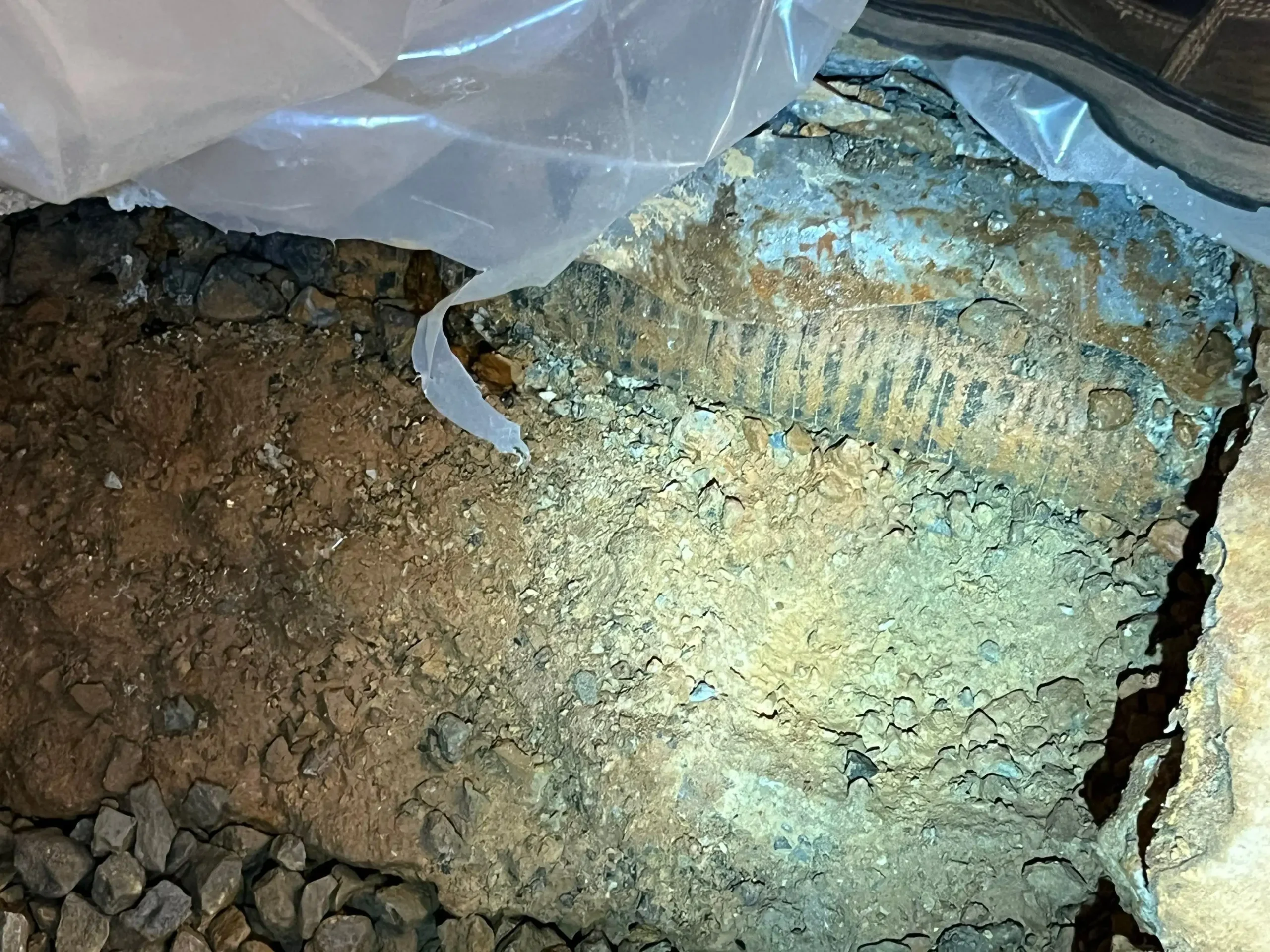 improperly installed system by previous company practically encased in concrete